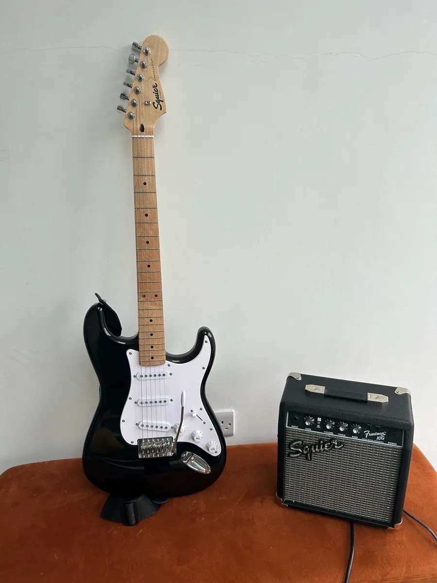 Squire Stratocaster electric guitar and Amp - Image 1