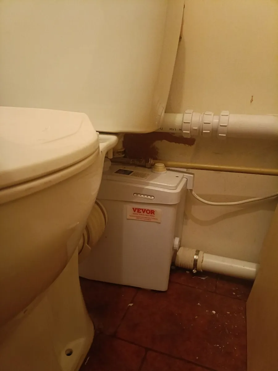 Bathroom with maserator pump - Image 1