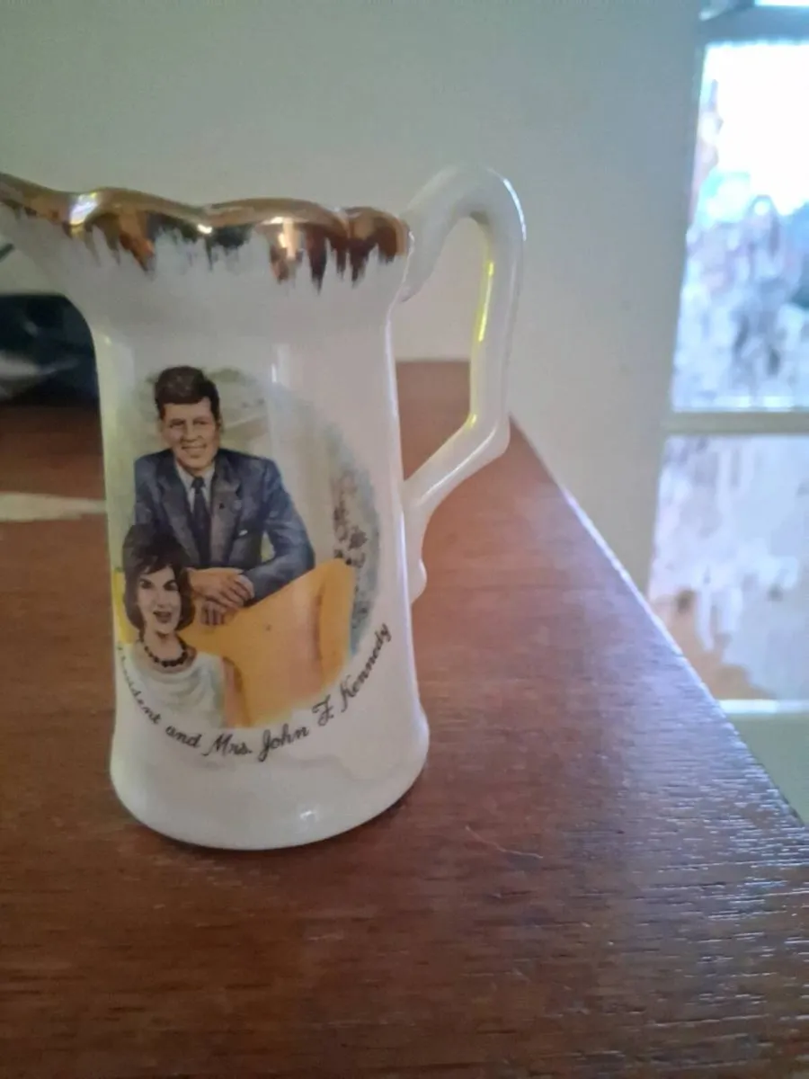 Antique jug and women's shoes - Image 1