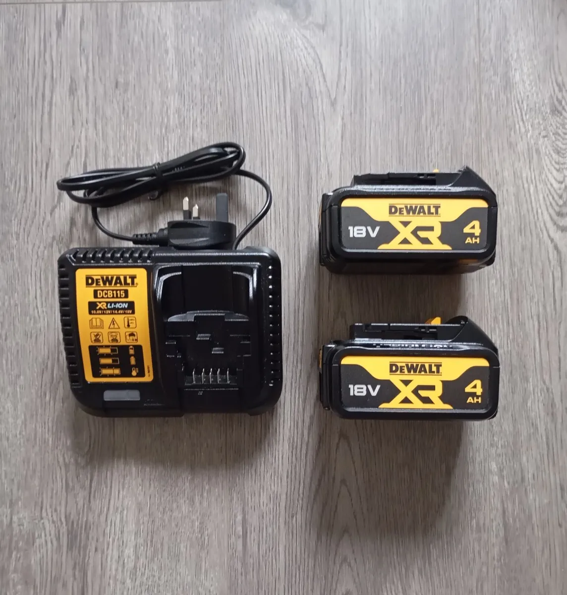 DeWalt Batteries and Charger (New) - Image 1