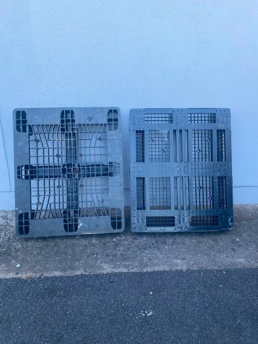 Two heavy duty plastic pallets