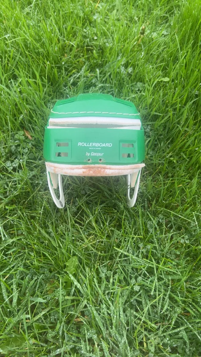 Green Stitched Helmet - Image 1
