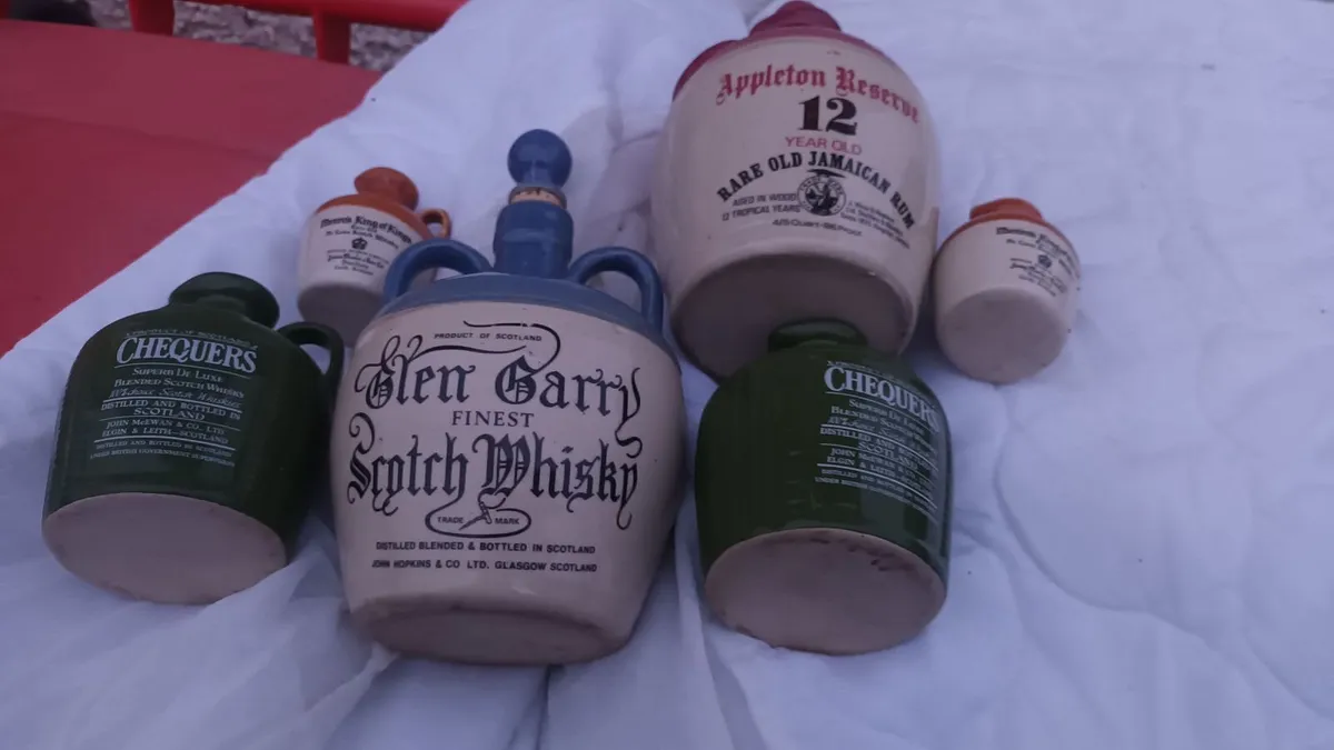 Old whiskey jugs - Image 1