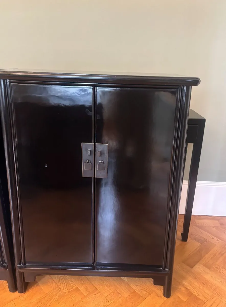 A pair of black laquered cabinets - Image 1