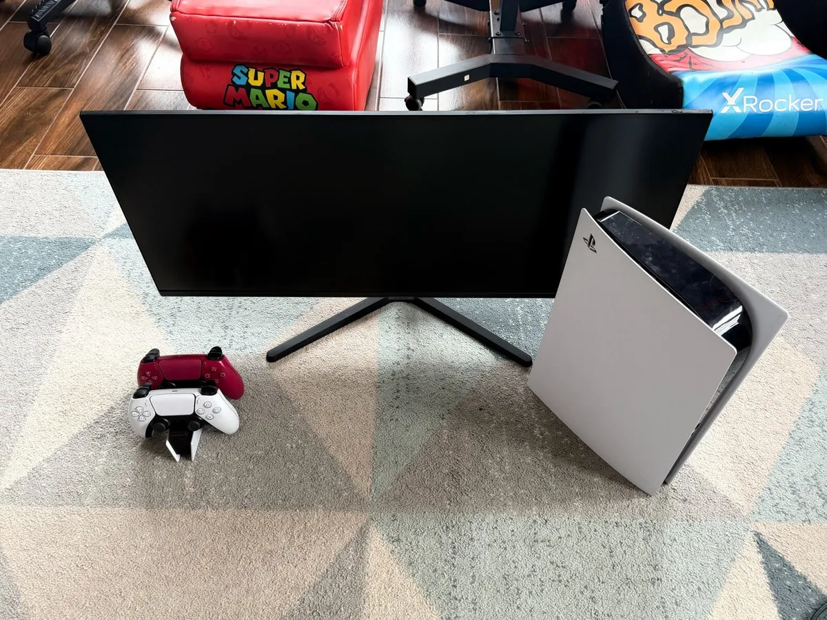 PS5 with 2 controllers and 30” gaming monitor - Image 1