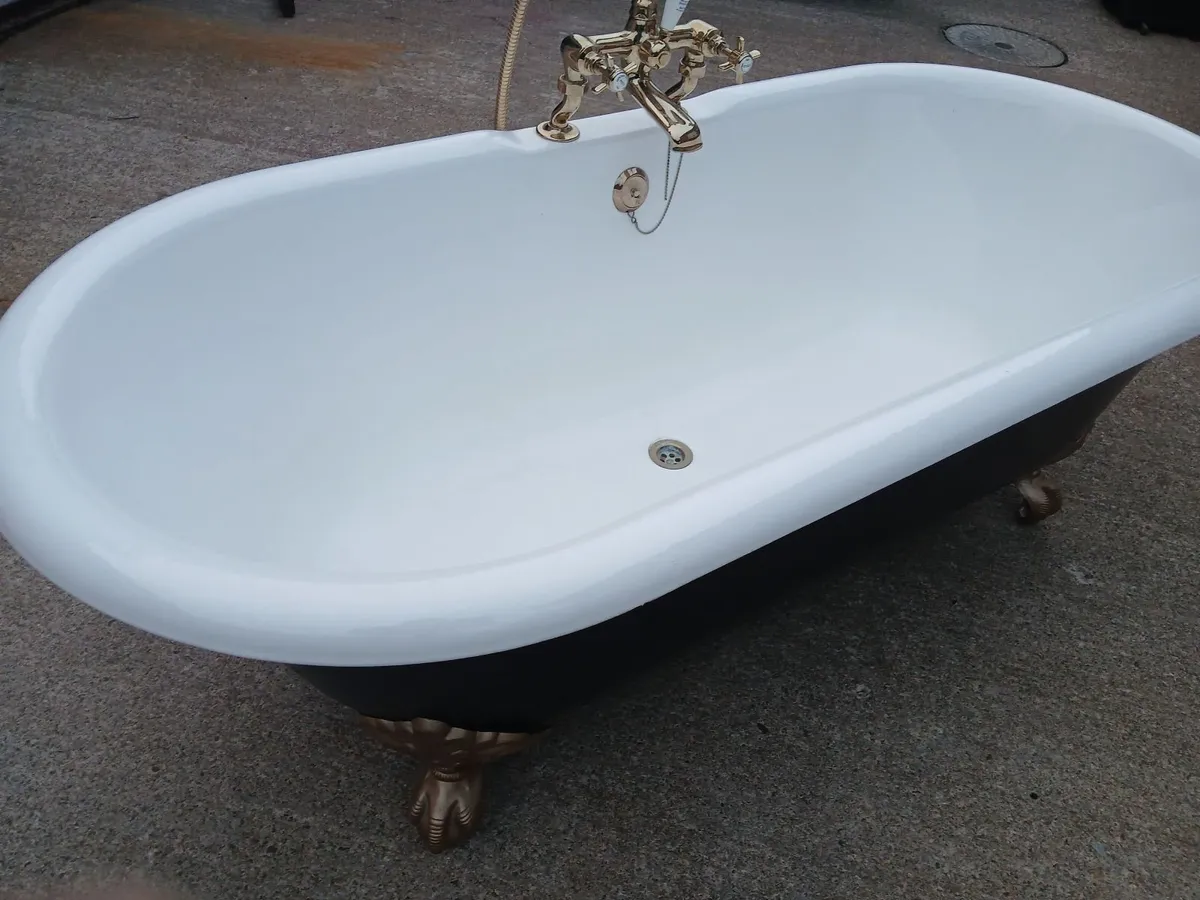 Cast iron bath & taps - Image 1