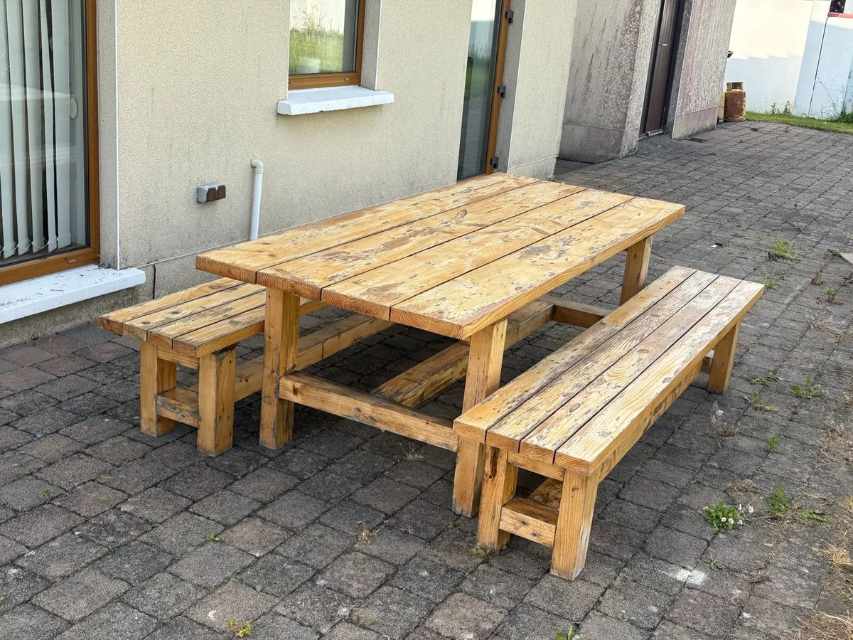 Large solid wood table and benches - Image 1
