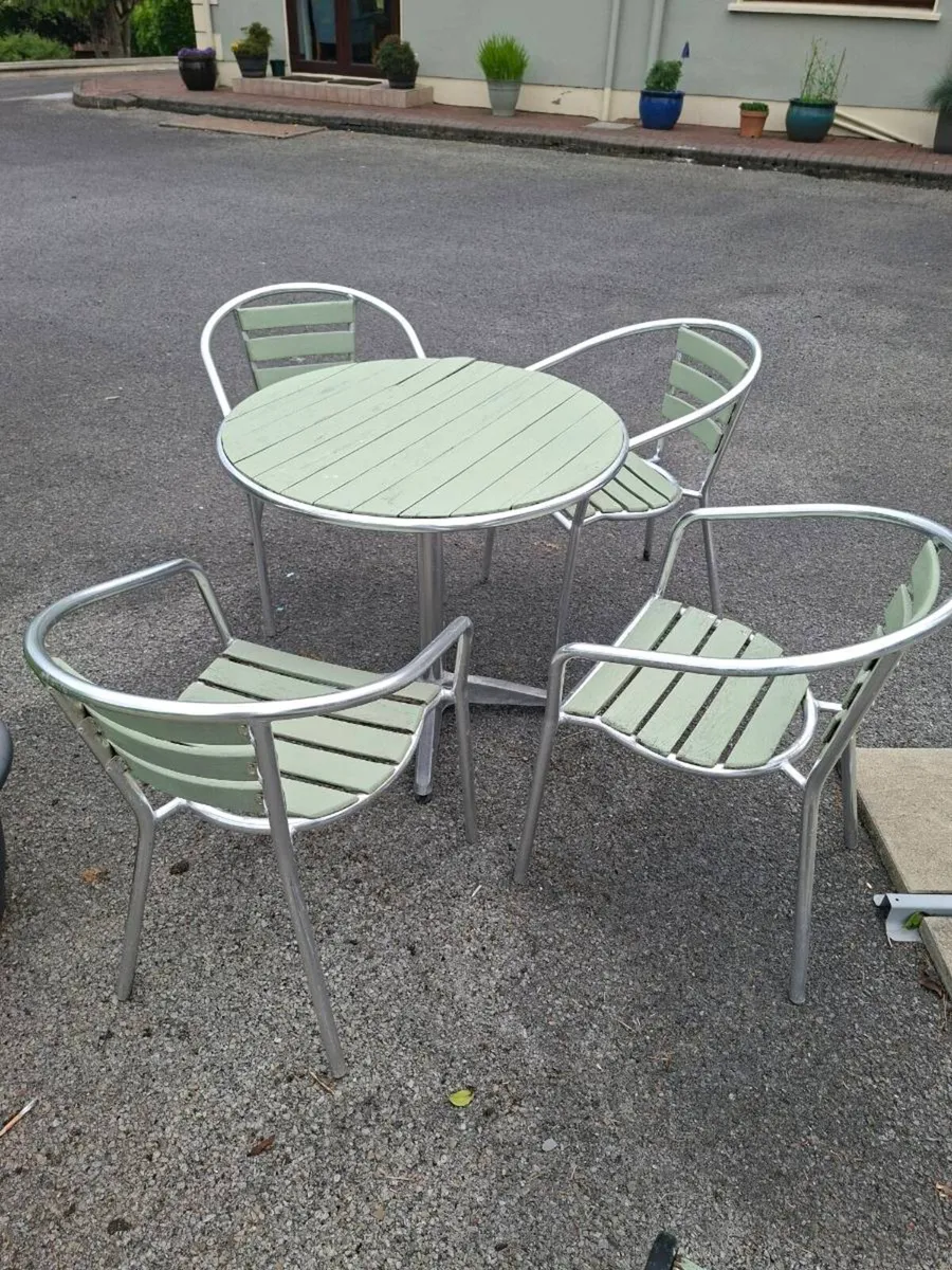Outdoor table and chairs - Image 1