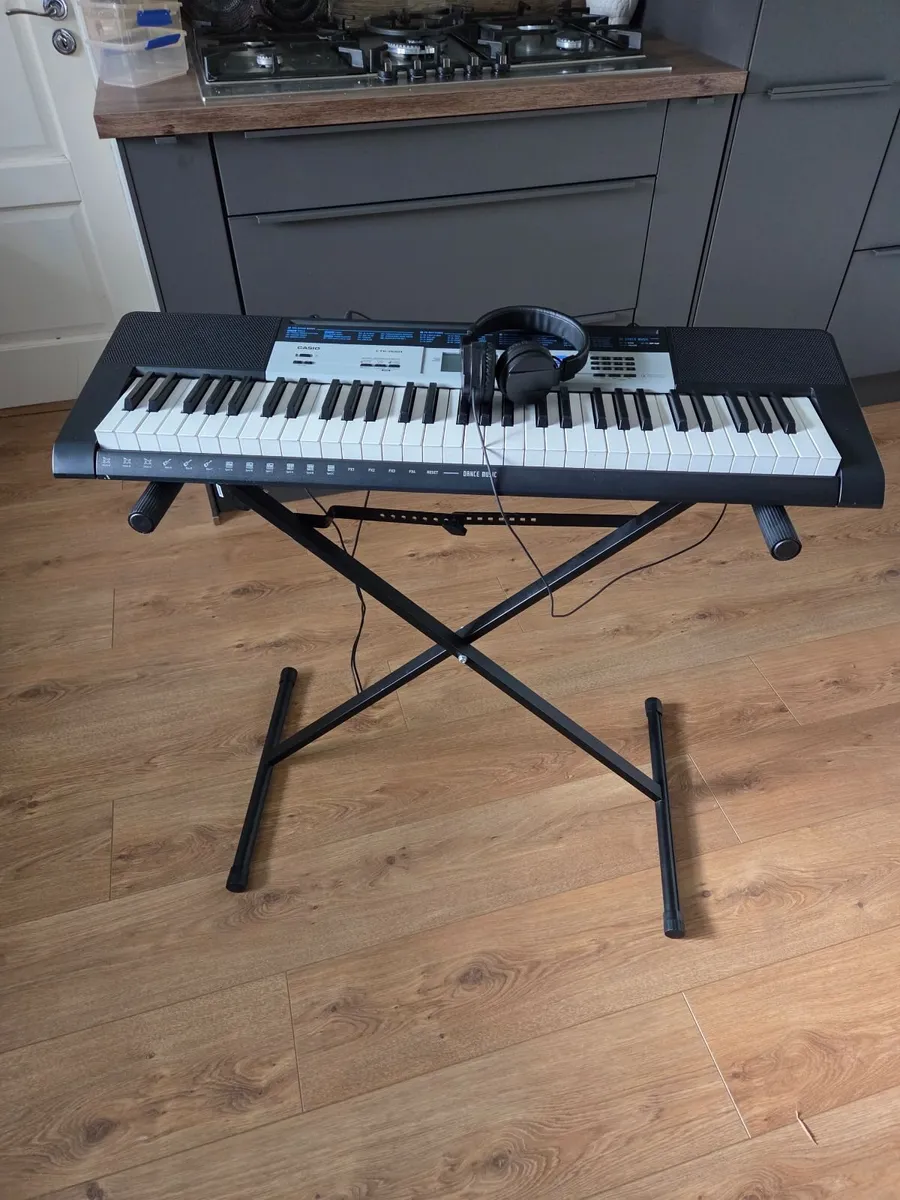 Casio CTK-1550 keyboard, stand & headphones - Image 1