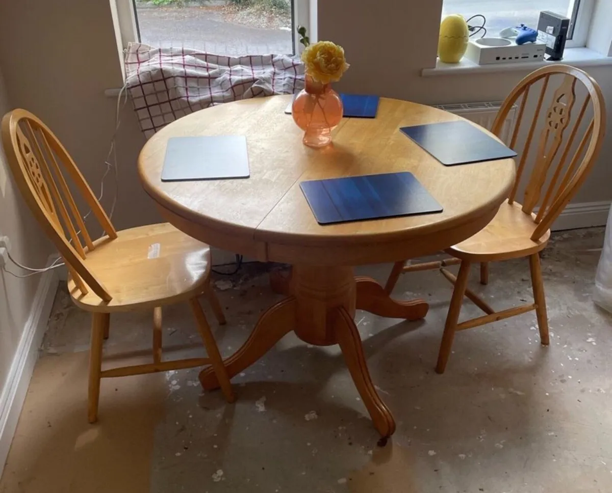 Solid Circular Extendable Kitchen Dining Table - Image 1