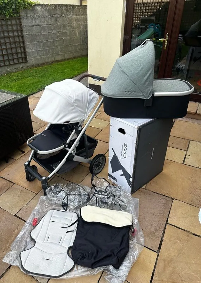 Uppababy Cruz V2 with Bassinet and Accessories - Sage Green and Cream - Image 1