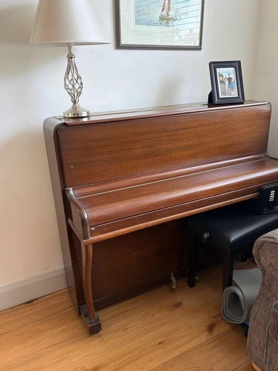 Piano & stool - requires tuning.