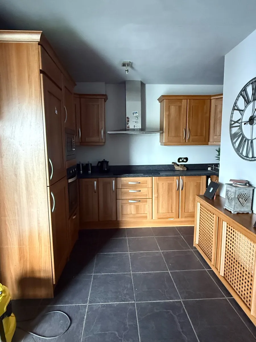 Full kitchen unit and table and chair - Image 1