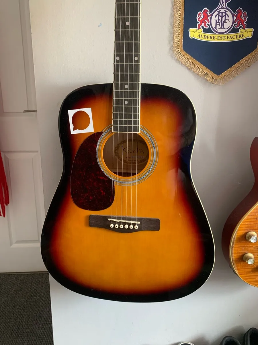 Acoustic Guitar - Image 1