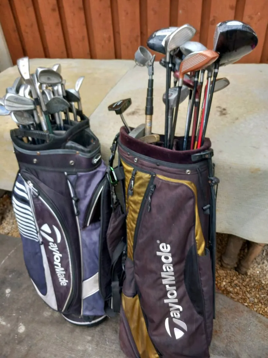 A selection of golf clubs and bags. - Image 2