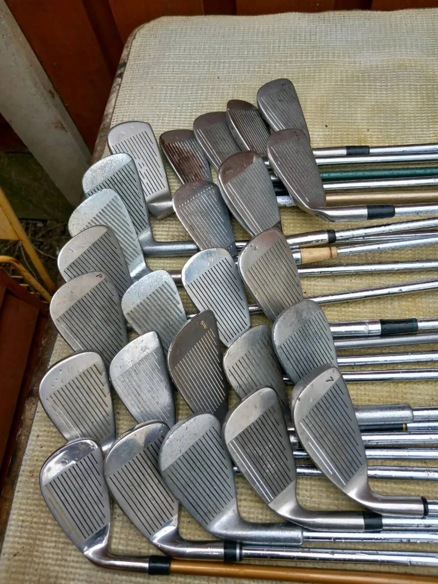 A selection of golf clubs and bags. - Image 3