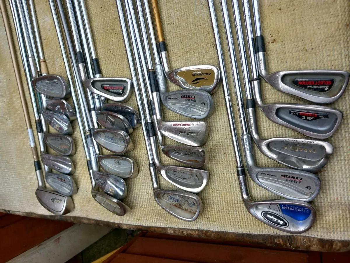 A selection of golf clubs and bags. - Image 4