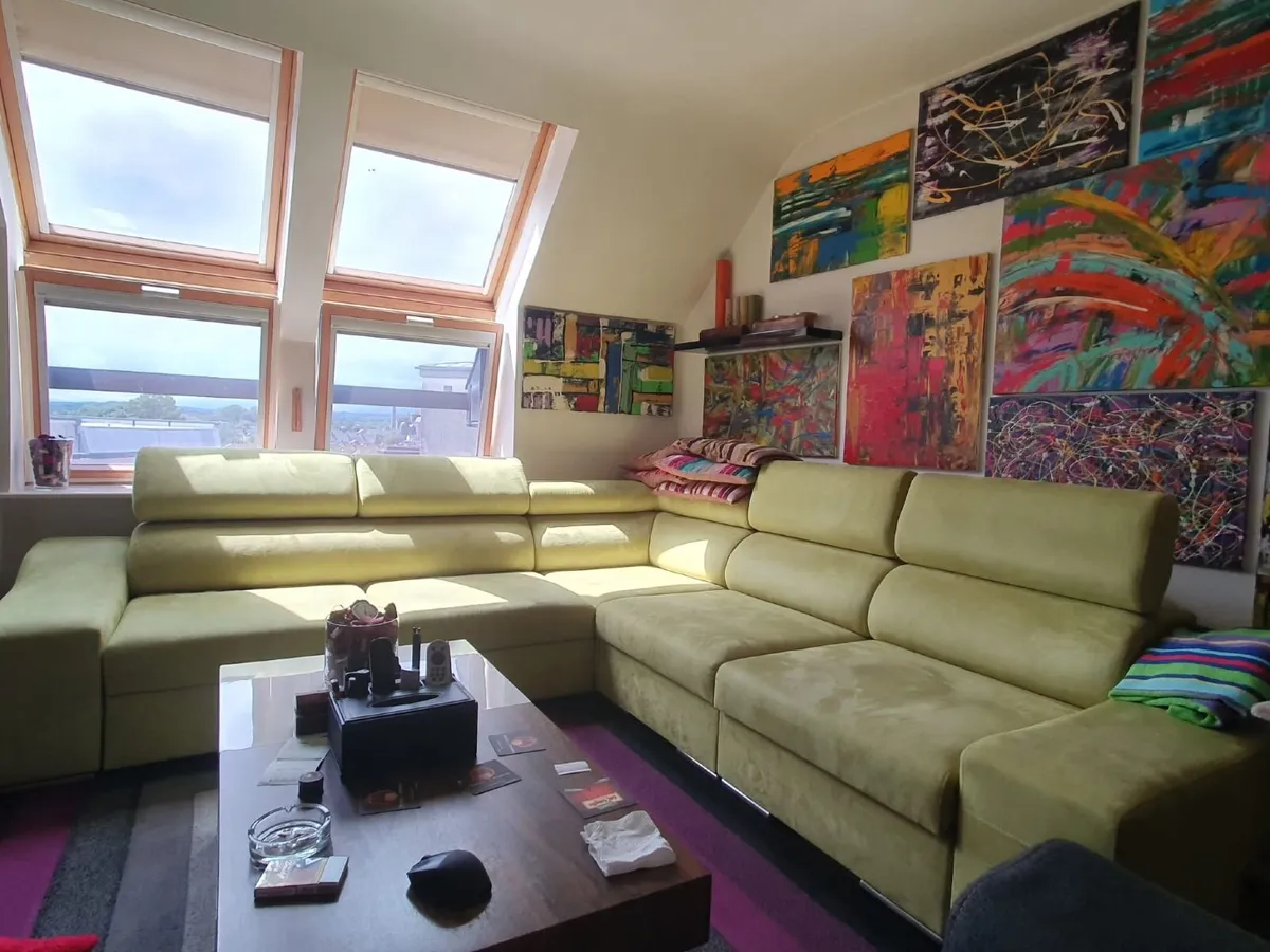 Large corner sofa with bed and storage - Image 1