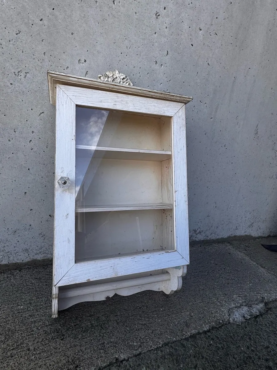 Vintage antique bathroom cabinet with towel rail