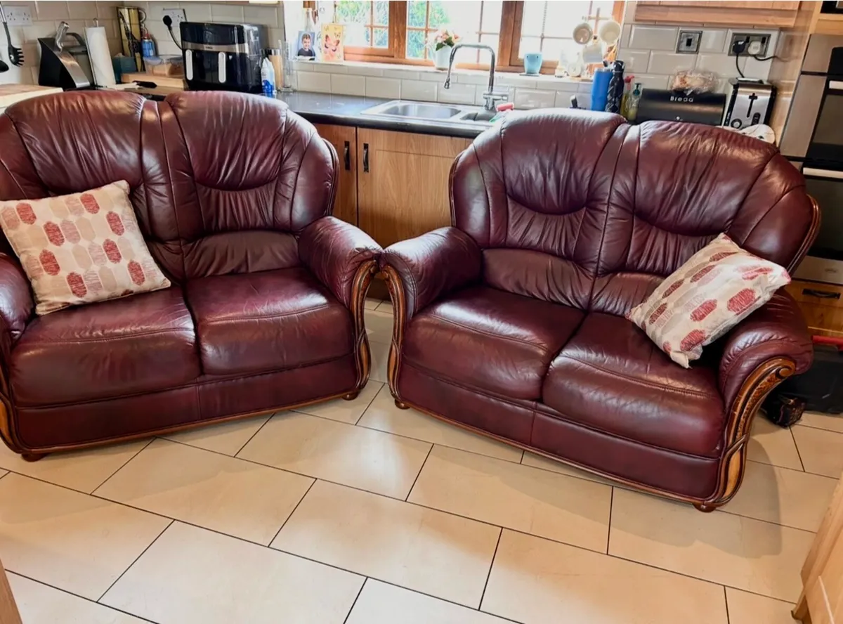 Two 2 seater red leather sofas - Image 1