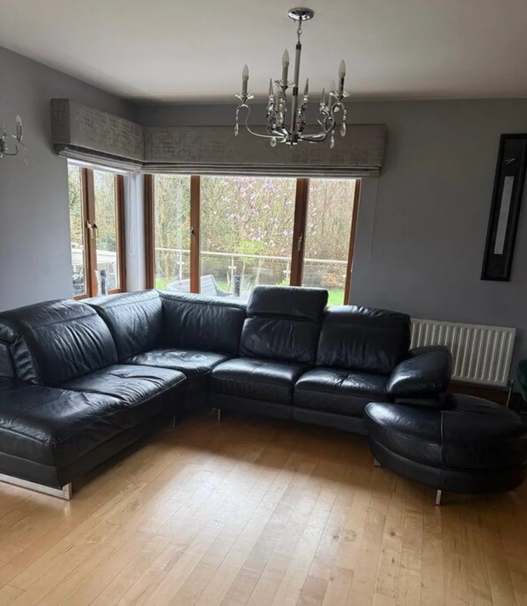 Leather corner unit sofa with matching foot stool