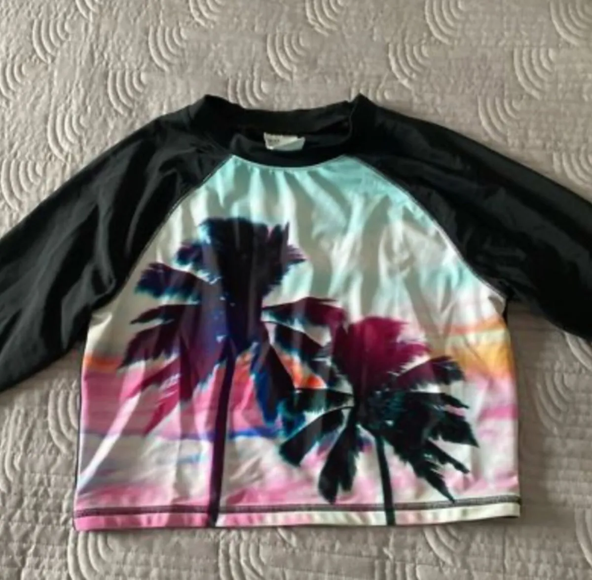 H&M Sun Protector Wet Top - Image 1