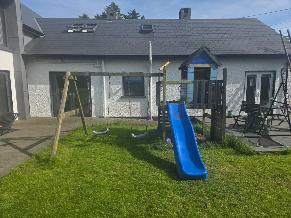 Outdoor Playhouse with Swings, Slide and climbing - Image 1