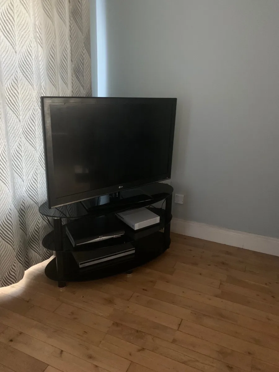 Tv and stand - Image 1