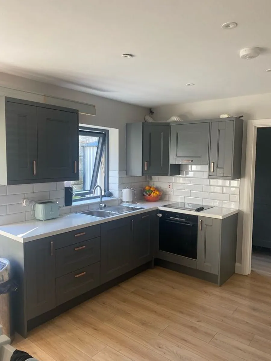 Kitchen doors and dishwasher and upvc door - Image 1