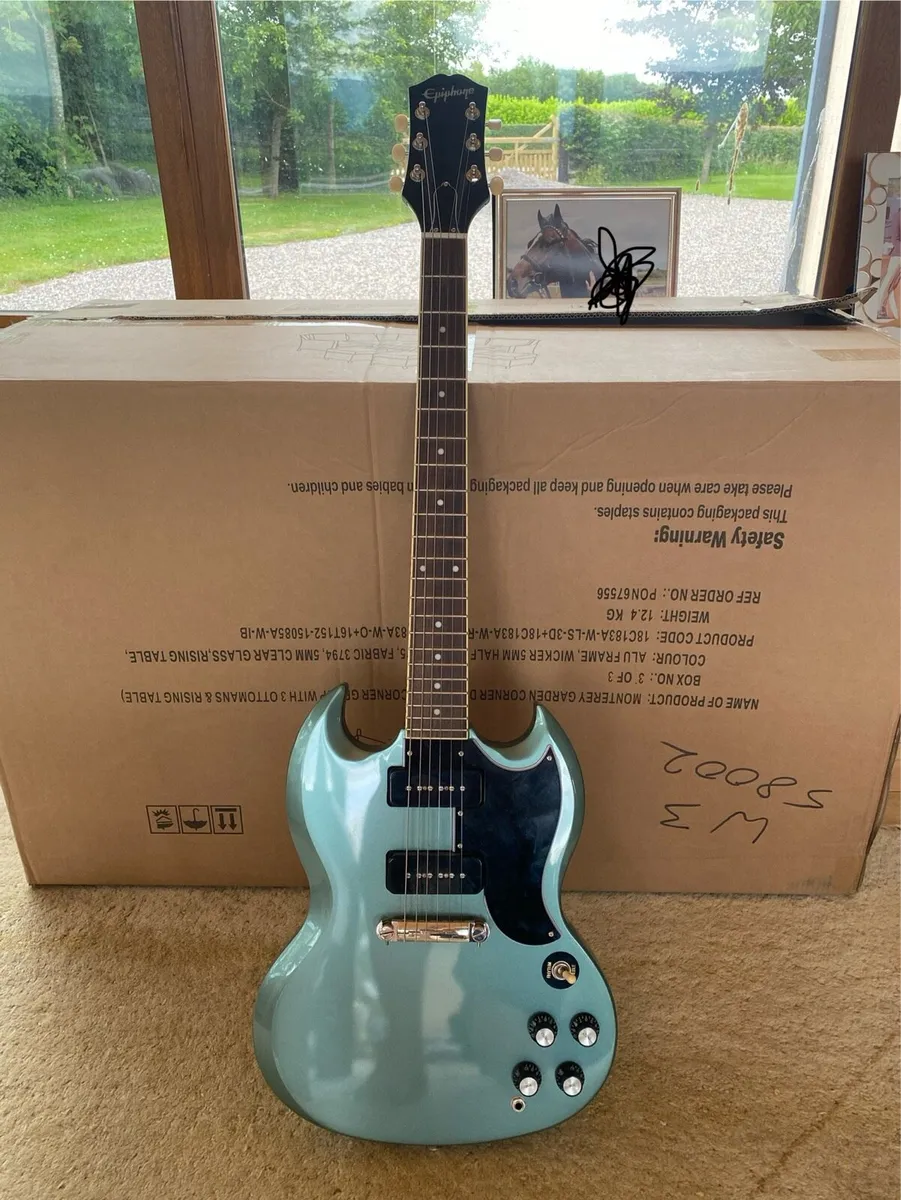 Epiphone SG special guitar and orange combo amp - Image 1