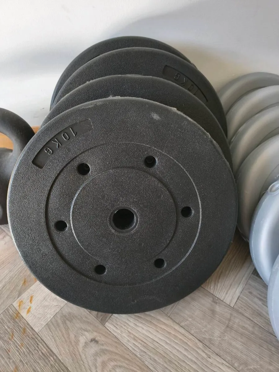 Huge selection of weights, bar and a kettle bell - Image 1