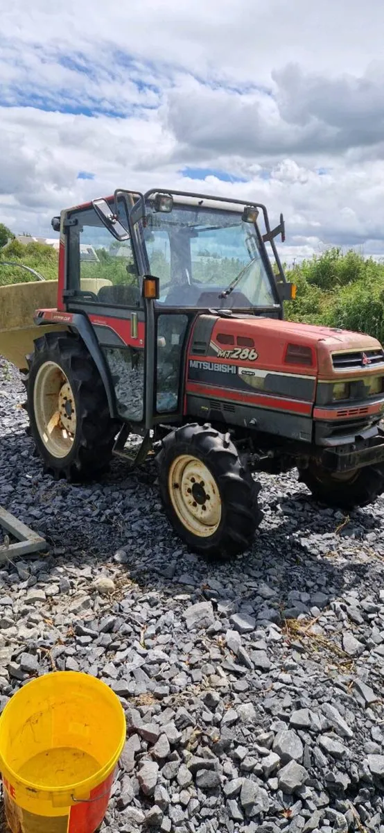 Compact tractor and attachments - Image 1