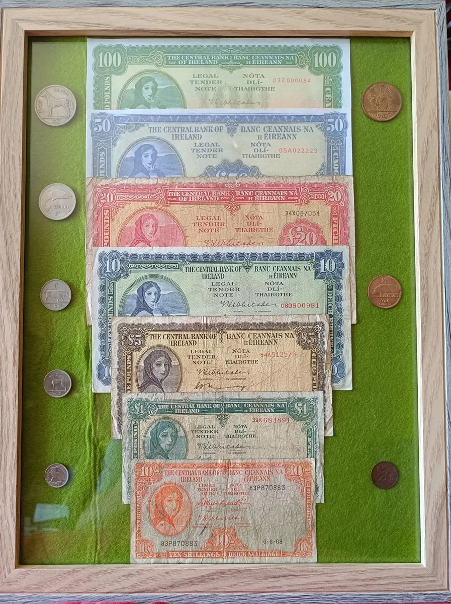 Lady lavery notes with coins in display frame
