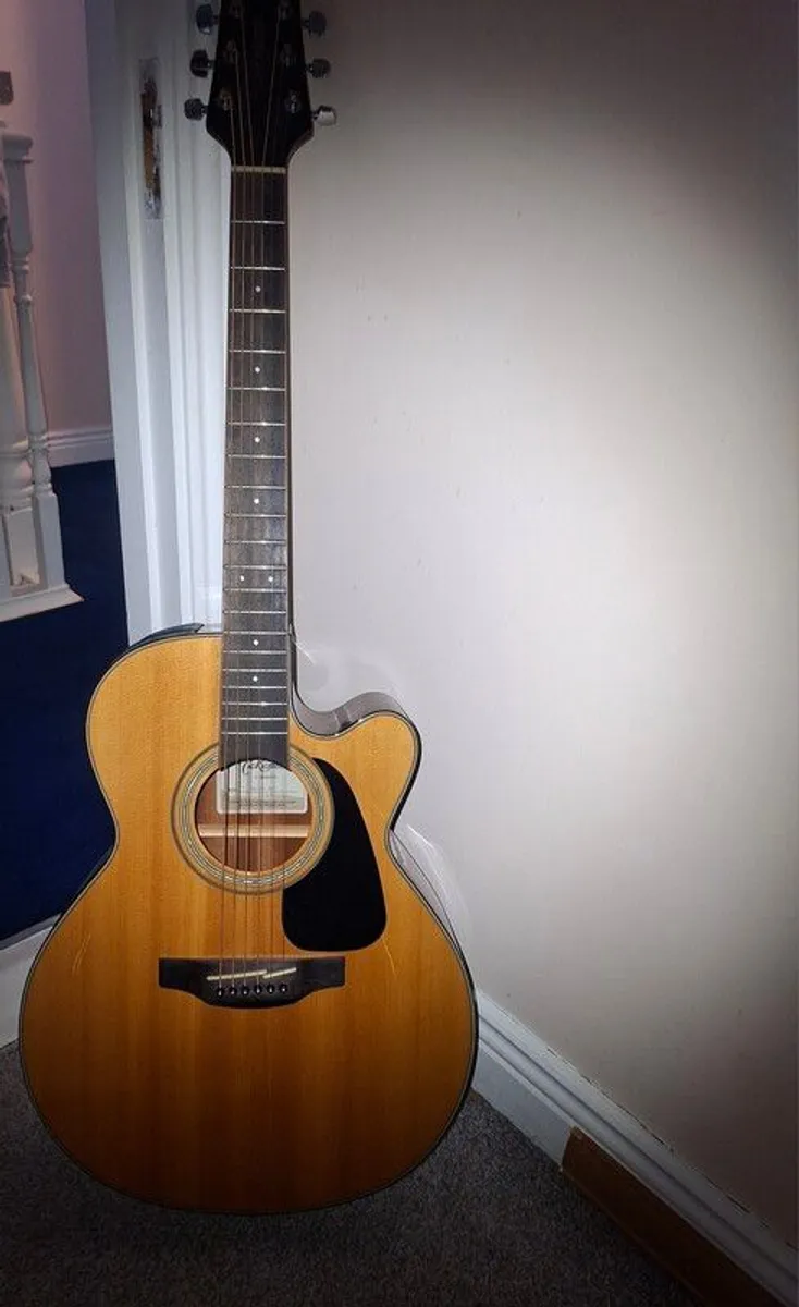 takamine acoustic guitar - Image 1