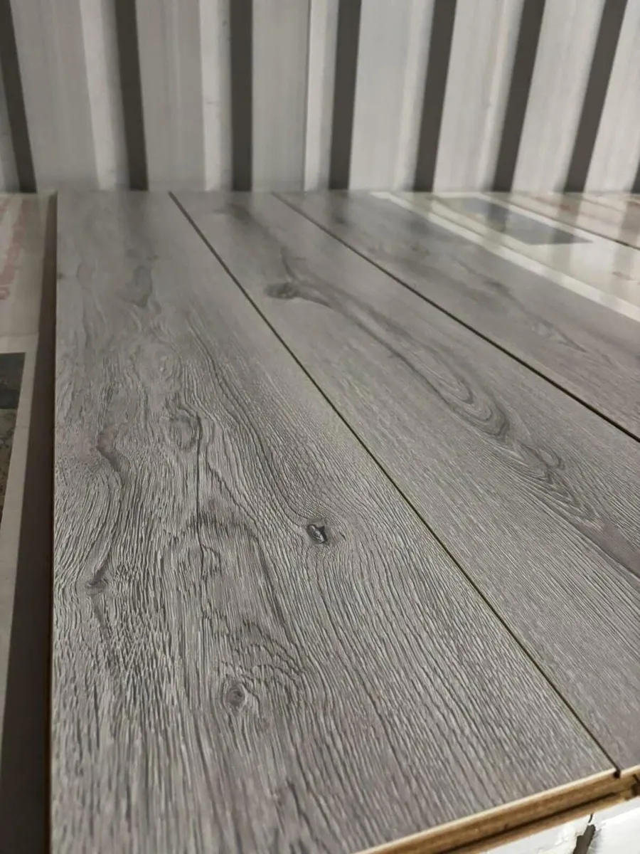 New 8MM Laminated Flooring - Image 1