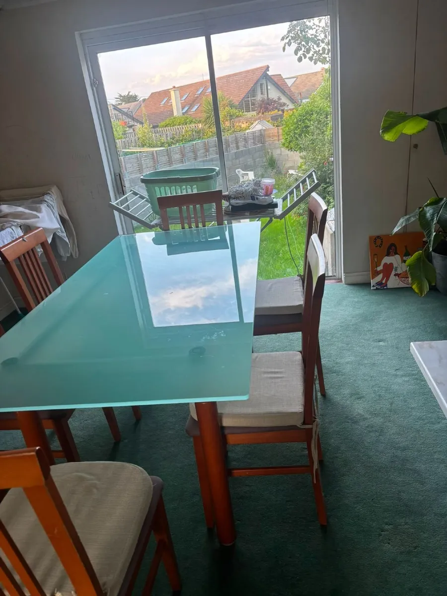 Glass dining table & 6 wooden chairs - Image 2