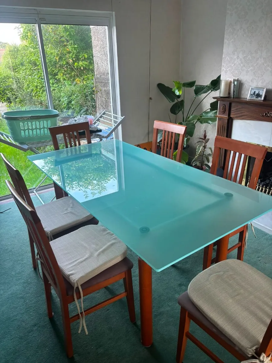 Glass dining table & 6 wooden chairs - Image 1