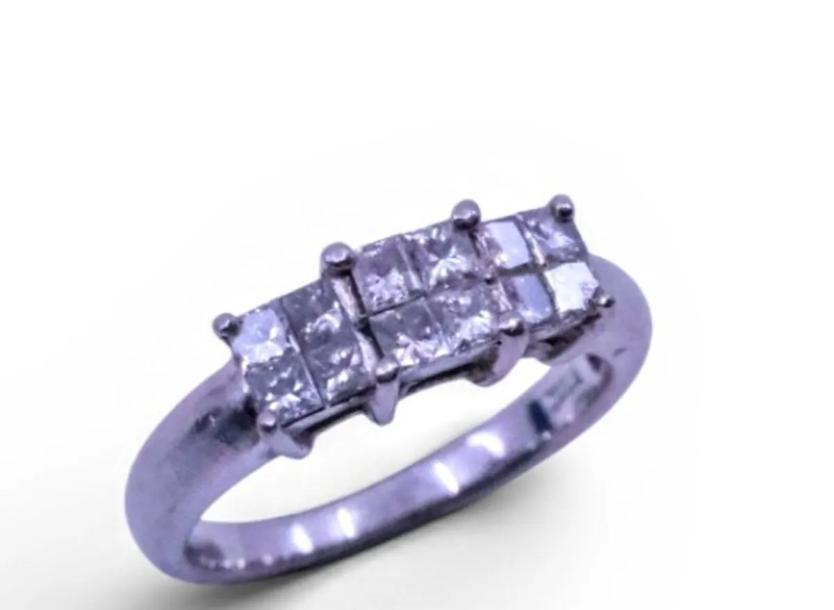 Heavy platinum diamond cluster ring.75ct