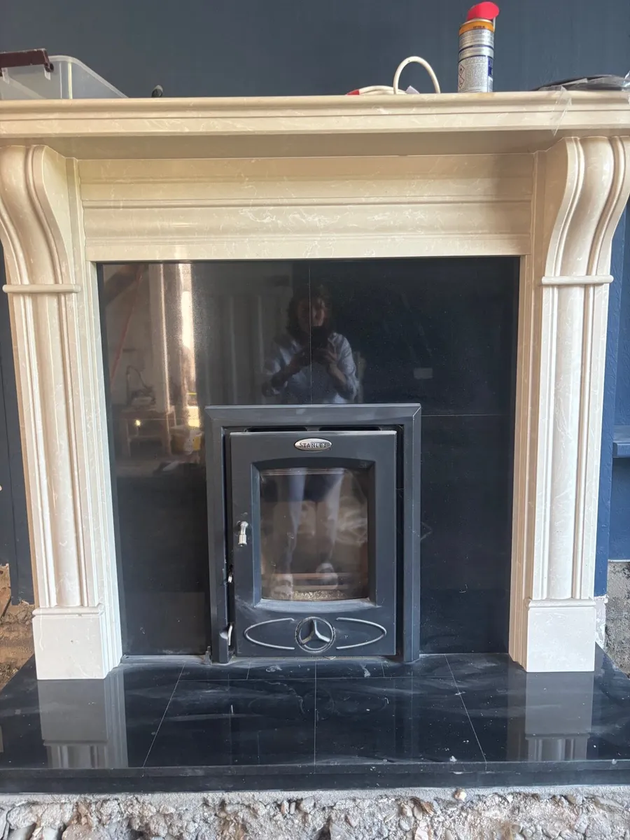 Stanley stove and Stone Firplace