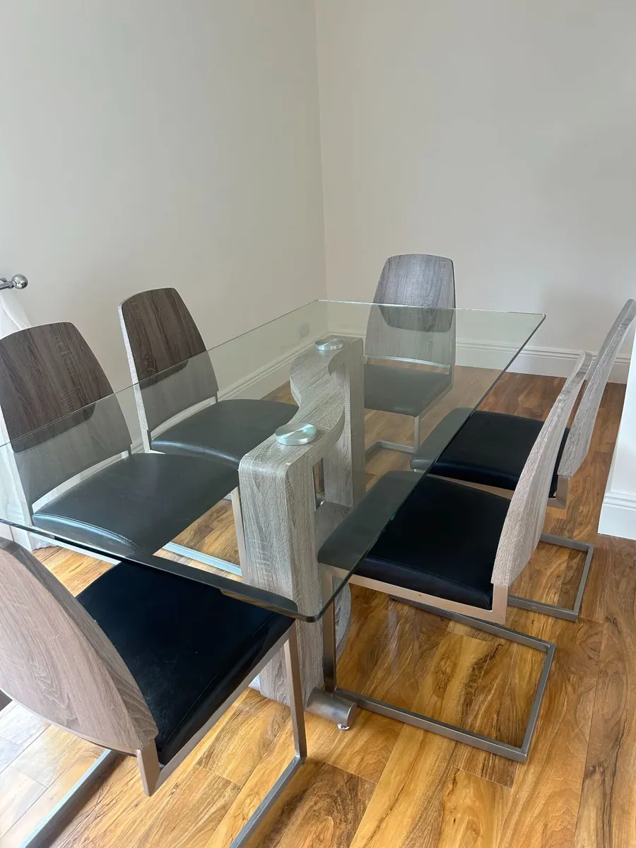 Beautiful Glass Dining Room Table and Chairs - Image 1