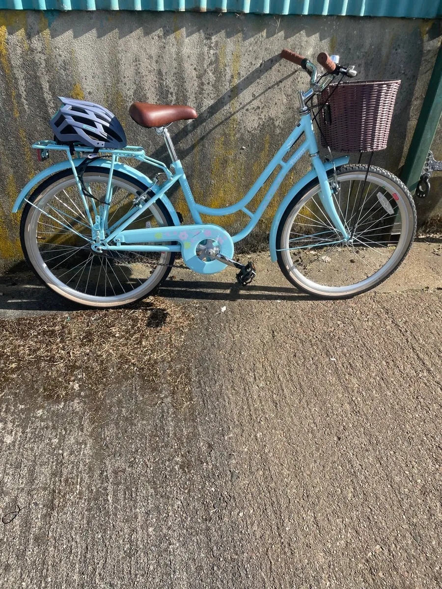 Beautiful girls walk threw town bike with basket - Image 1