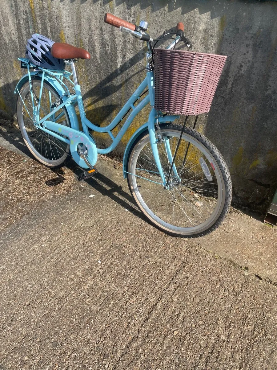 Beautiful girls walk threw town bike with basket - Image 2