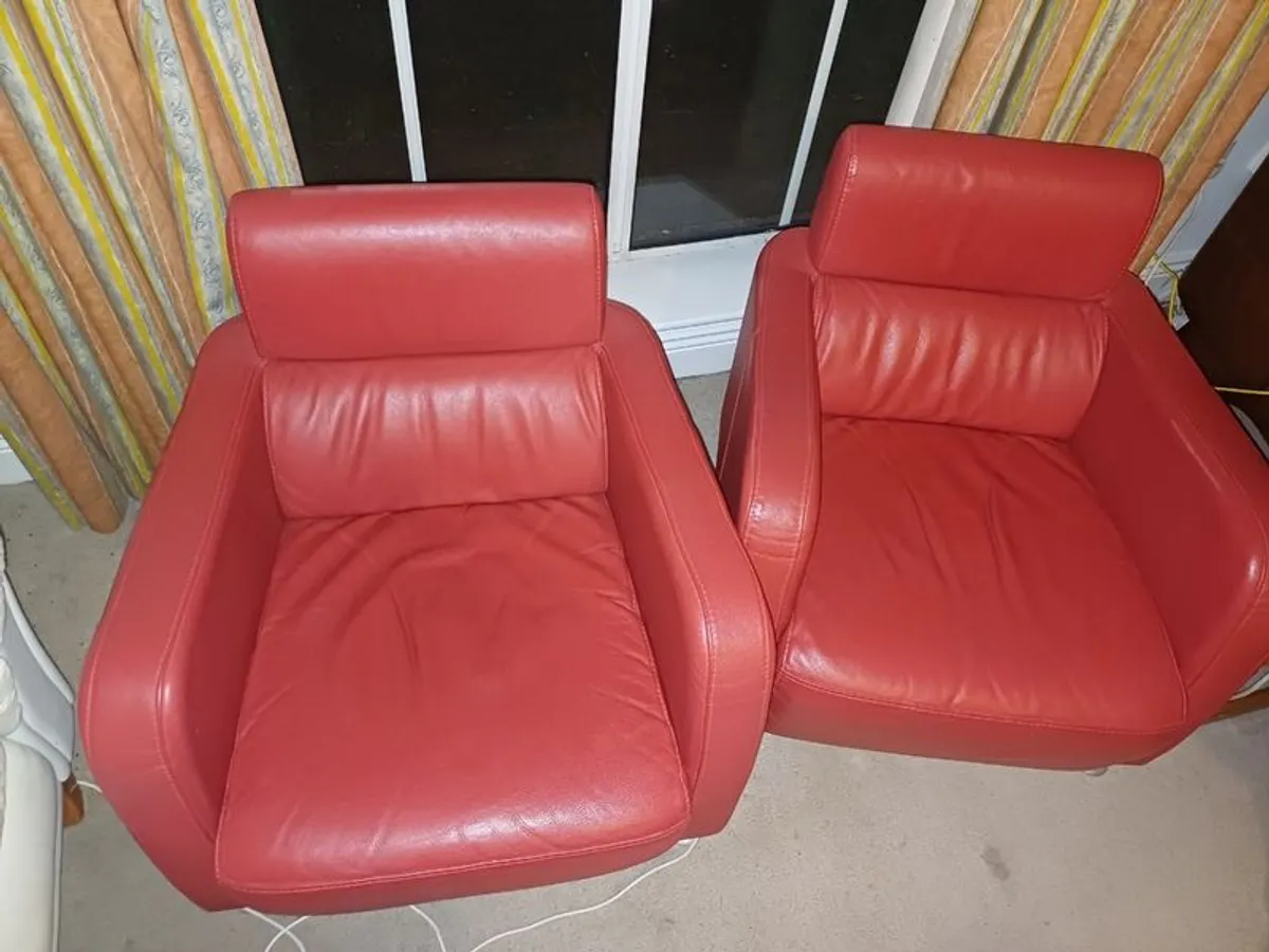 Two Italian leather armchairs
