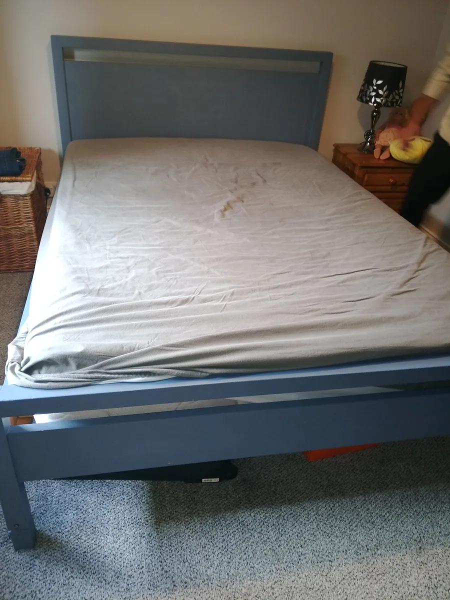 Two beds with mattresses