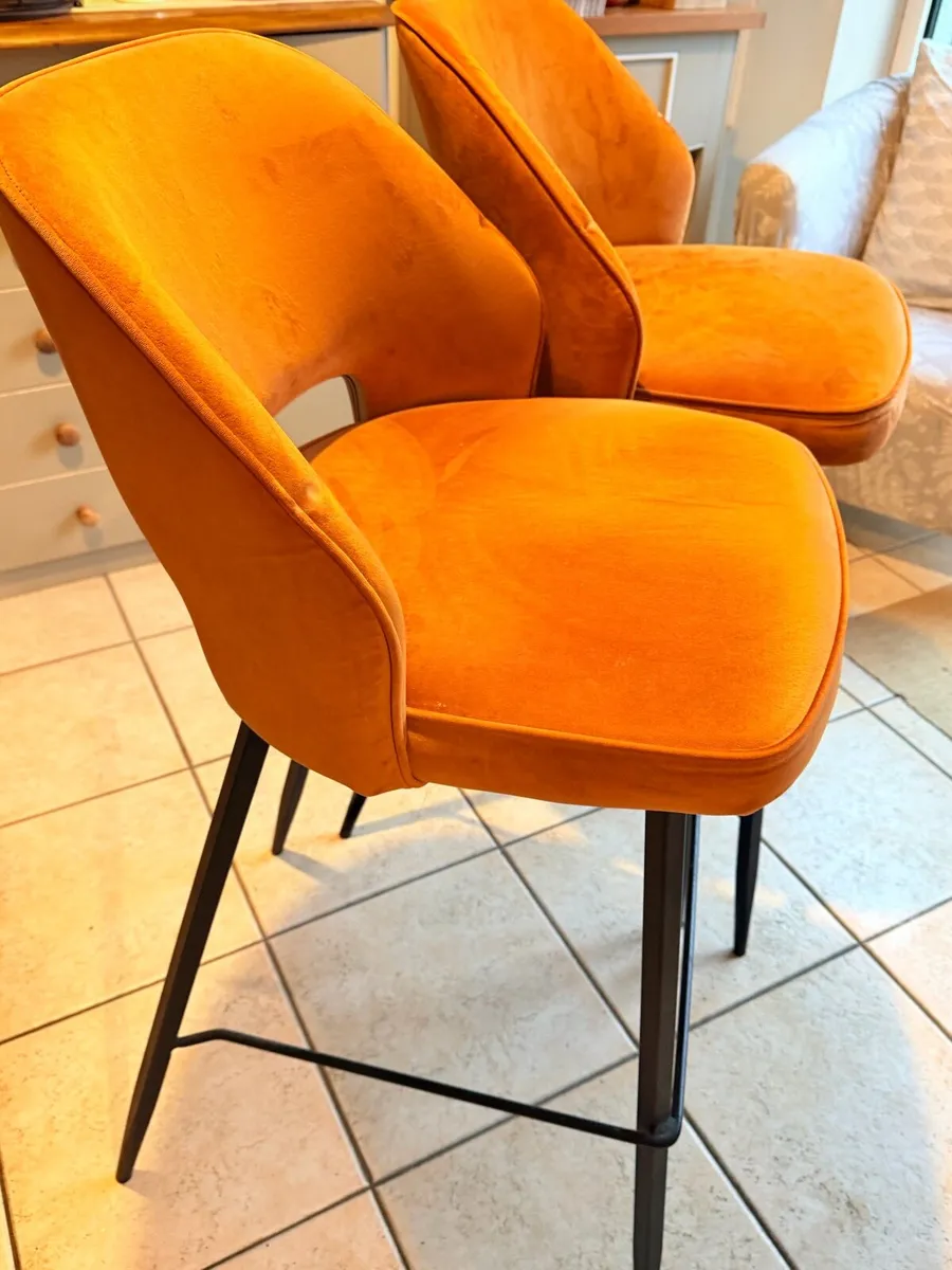 Two high stools. Burnt orange colour like new