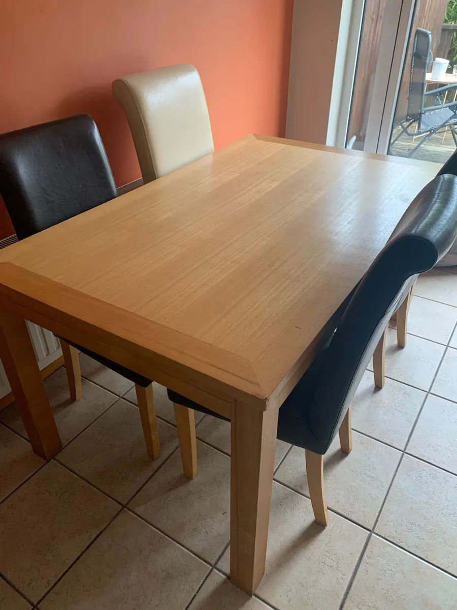 Table and three  chairs