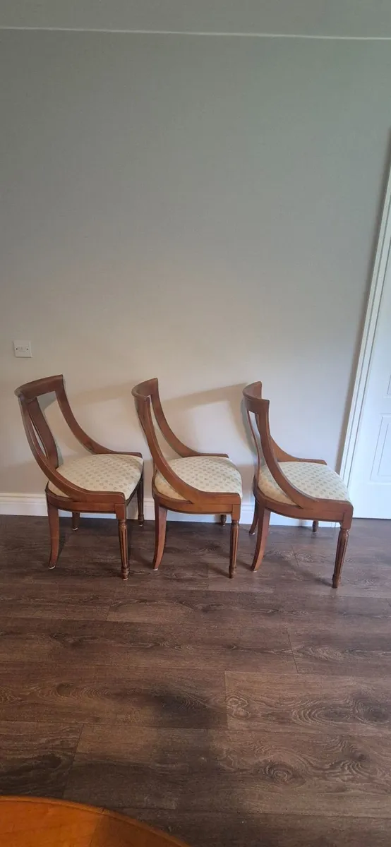 Marcoan Round to Oval Dining Table and Chairs - Image 2