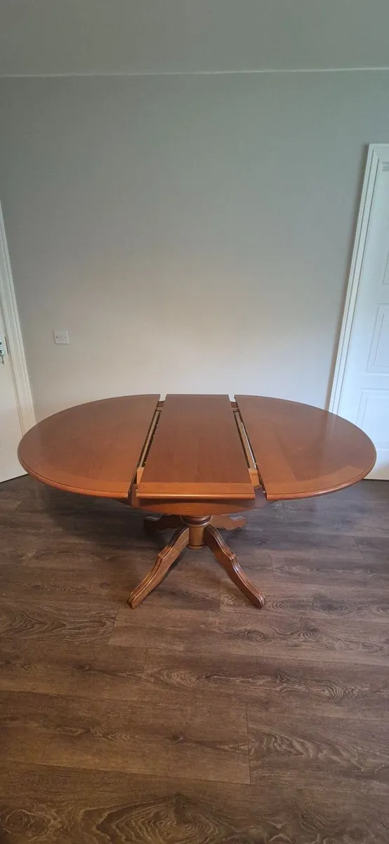 Marcoan Round to Oval Dining Table and Chairs - Image 3