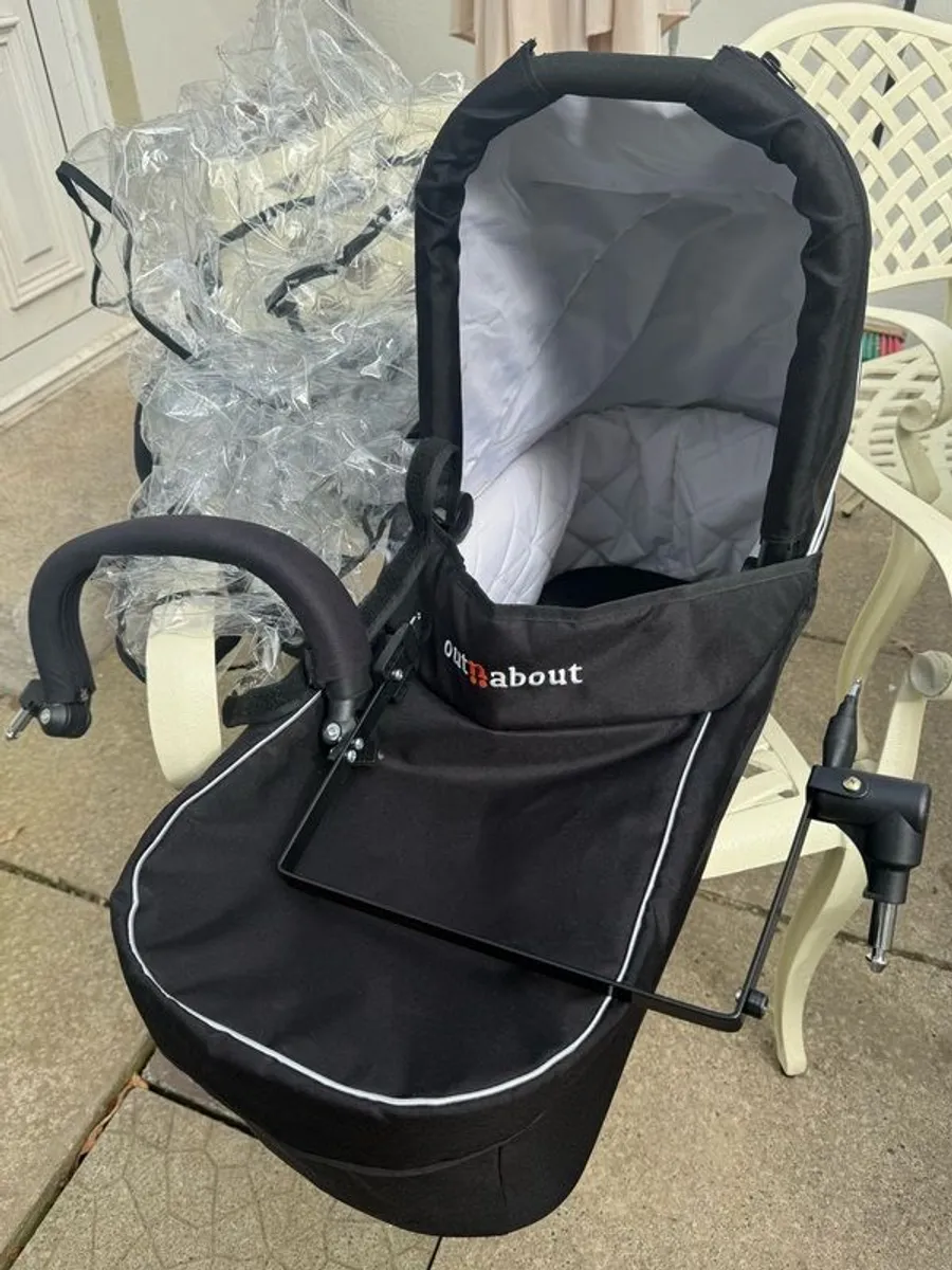 Out and About double carrycot summit black and double carrycot adapter and rain cover included - Image 1