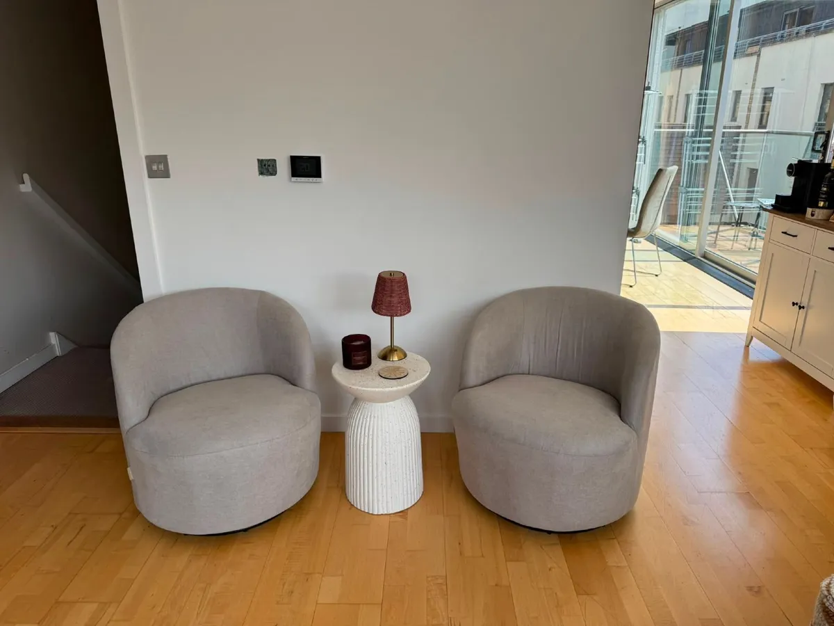 Selling 2 x Laura James Swivel Chairs – Brand New